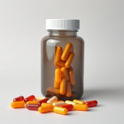 Supplement jar with capsules beside it
